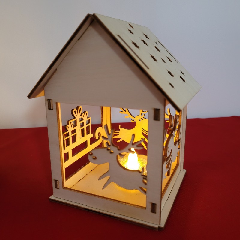 lampion z reniferami i saniami